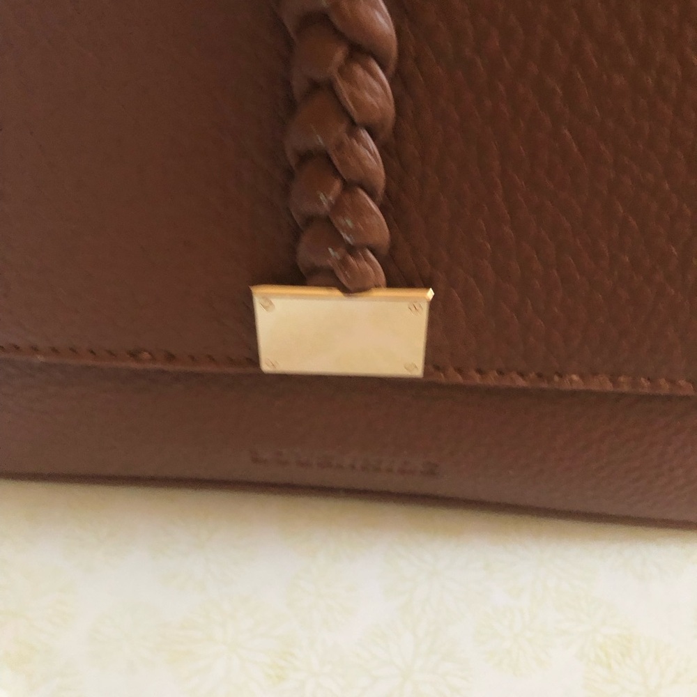 Brown Shoulder Bag with Braided Detail and Metallic Accent